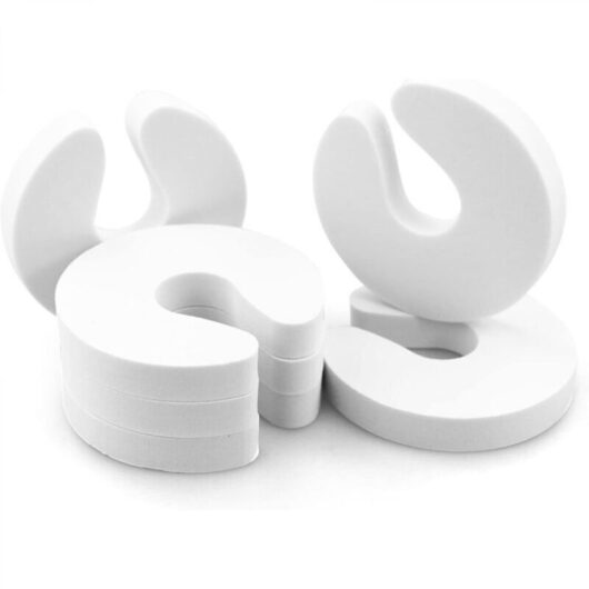White 20mm thick anti-pinch door stop with 6 silent EVA foam protective clips to ensure child safety.